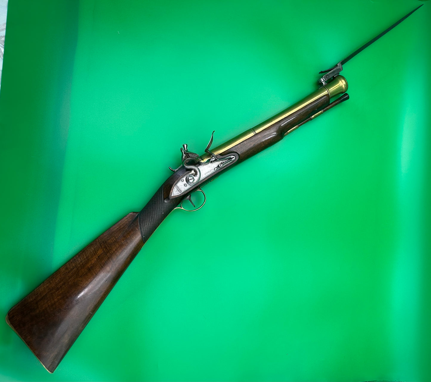 A Handsome Brass Barrelled Flintlock Blunderbuss With A Top Mounted Sprung Bayonet