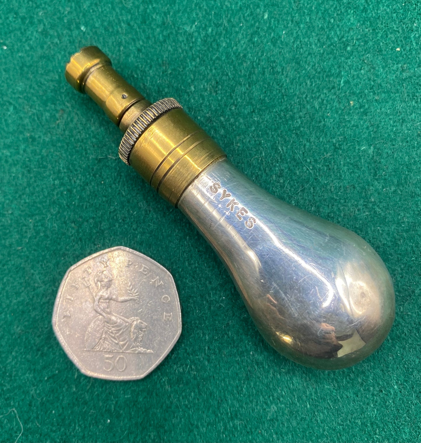 A Tiny And Unusual Sykes Silver (White Metal) Pistol Powder Flask